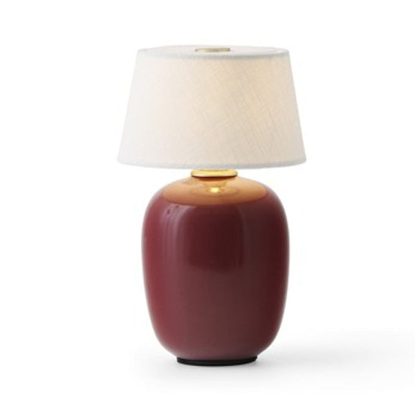 Audo CPH Torso Table Lamp, Portable (Diam. 11.7 cm) by Audo Copenhagen - Product Information: The Torso Portable Table Lamp by Kroyer-Saetter-Lassen is a miniature version of their popular full-size design of the same name, which takes its design cues fro