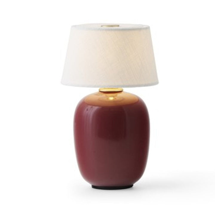 Audo CPH Torso Table Lamp, Portable (Diam. 11.7 cm) by Audo Copenhagen - Product Information: The Torso Portable Table Lamp by Kroyer-Saetter-Lassen is a miniature version of their popular full-size design of the same name, which takes its design cues fro