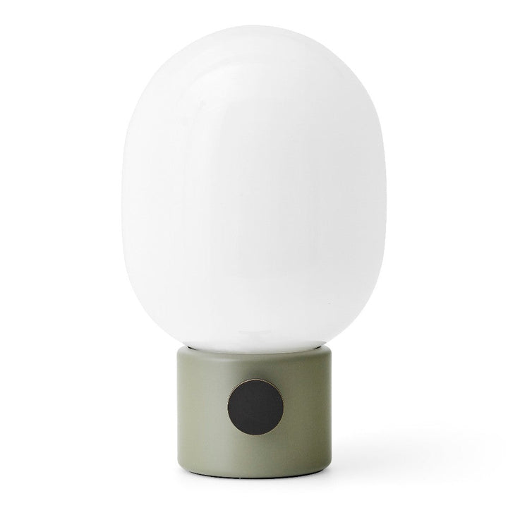 Audo CPH JWDA Table Lamp by Audo Copenhagen - The JWDA Lamp is an immediate statement piece, combining sculptural appeal with room-transforming presence. Its design features a striking balance between the fragile, curved glass and the robust metal base, c
