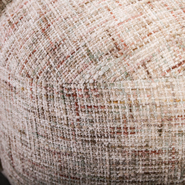 Aslan Occasional Chair Tawny The Aslan Occasional Chair invites you to sink into plush comfort with its curved silhouette and soft, textured upholstery. This chair introduces a vibrant, multi-coloured fabric that adds bold personality while maintaining a