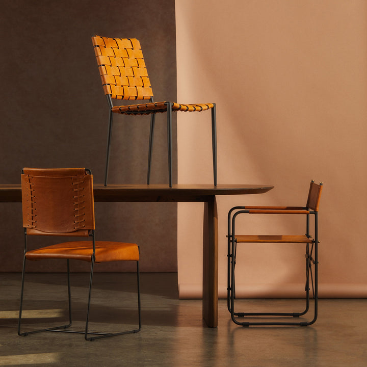 Batali Dining Chair Tan displayed alongside a modern wooden dining table with a warm, minimalistic backdrop.