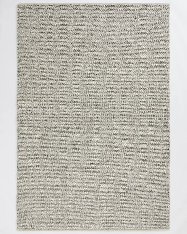 Emerson Feather - Hand-Woven Floor Rug Discover the Emerson Feather rug, a soft and textured piece made from wool and viscose, perfect for any space.