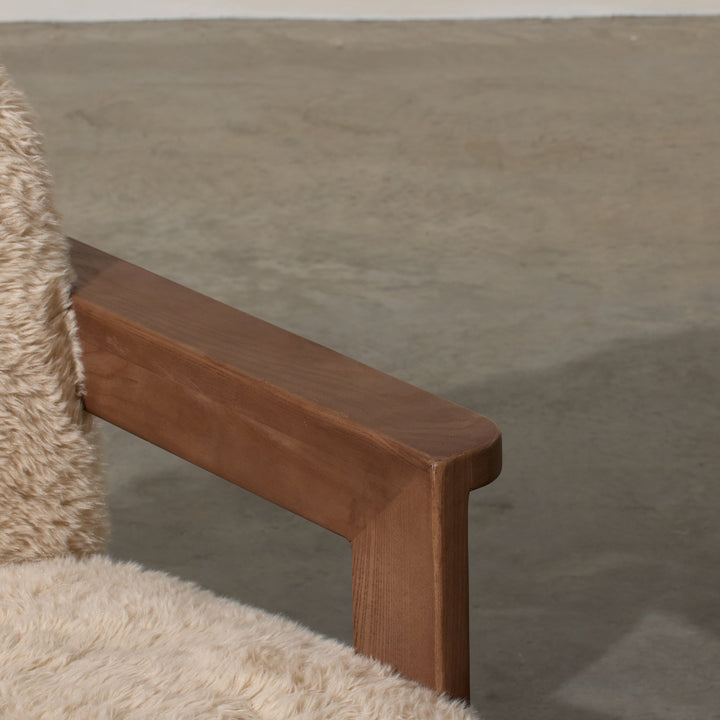 Corwin Occasional Chair Yakety Yak Our Corwin Occasional Armchair is mid-century inspired statement piece that blends sculptural elegance and grounded design. This unique upholstere chair features wooden arms that seamlessly extend into the base, eliminat