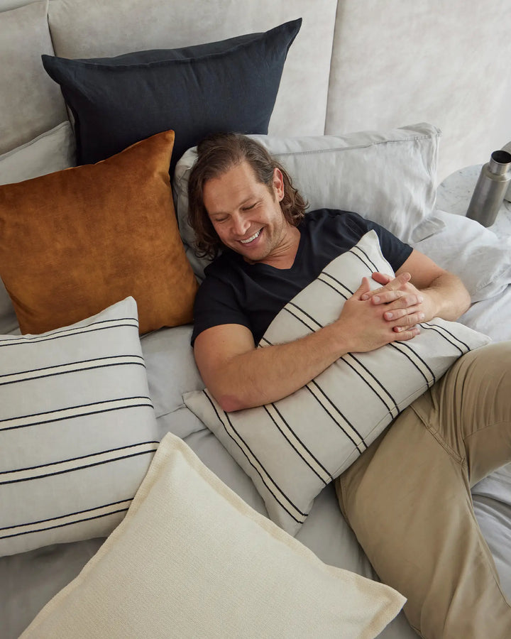 Ava Ochre: Luxurious Velvet Cushion Discover the Ava Ochre cushion in rich burnt orange, perfect for autumn themes. Soft, low maintenance, and available in over 20 colors!