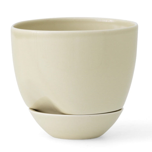 Audo CPH Hydrous Planter (Diam. 20 cm), Ashen by Audo Copenhagen - Product Information: Our clever, self-watering pot ensures easy plant care whether you are home or away. Shaped from stoneware glazed for a glossy finish, the practical design enables the