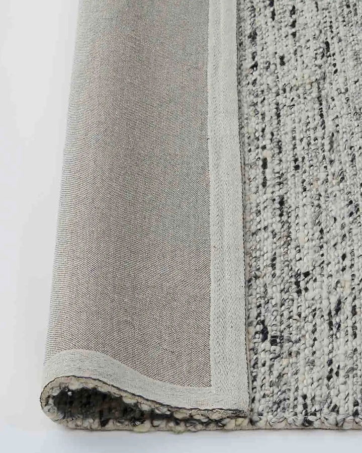 Dolomite Pepper - Ethically Hand-Woven Exquisite Rug Discover the Dolomite Pepper rug, beautifully hand-woven for any interior. Soft, stylish, and perfect for living areas.