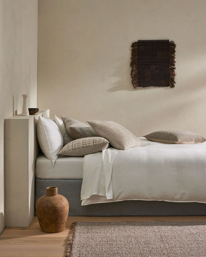 Dania Oyster A contemporary, plain with a woven texture that is both soft to touch and durable. A timeless design with visual interest. Dania has an earthen, naturalistic palette, making it versatile for any space. Trending in colour, Oyster is a warm two