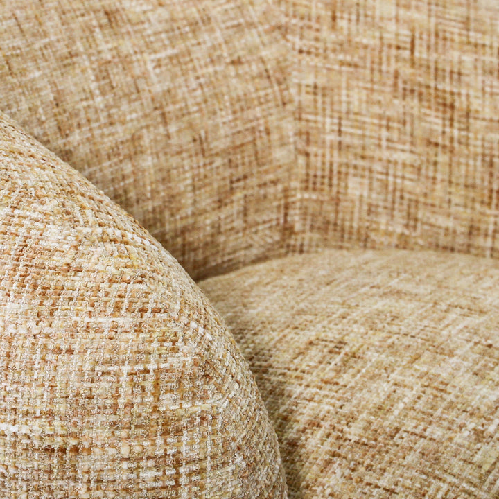 Aslan Occasional Chair Honey The Aslan Occasional Chair invites you to sink into plush comfort with its curved silhouette and soft, textured upholstery. This chair introduces a vibrant, multi-coloured fabric that adds bold personality while maintaining a