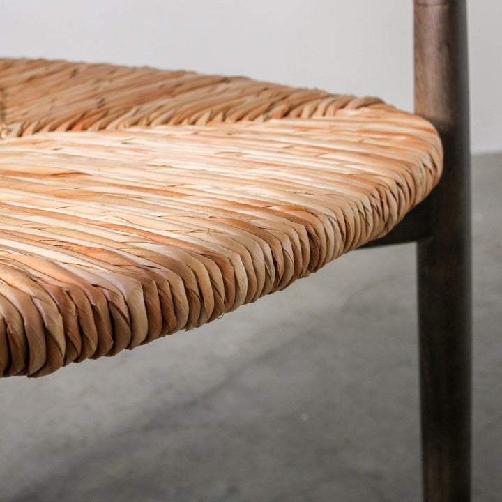 Essence Dining Chair Leaf Rope/Smoke woven leaf rope seat detail showcasing artisanal craftsmanship.