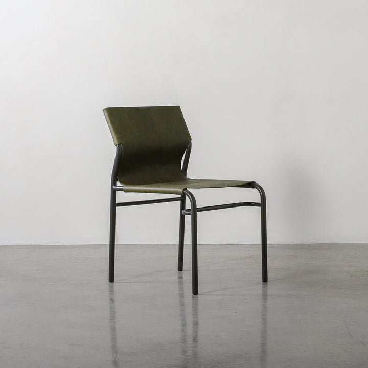 Fieri Dining Chair Olive featuring an olive leather seat and sleek metal frame, ideal for modern dining spaces.
