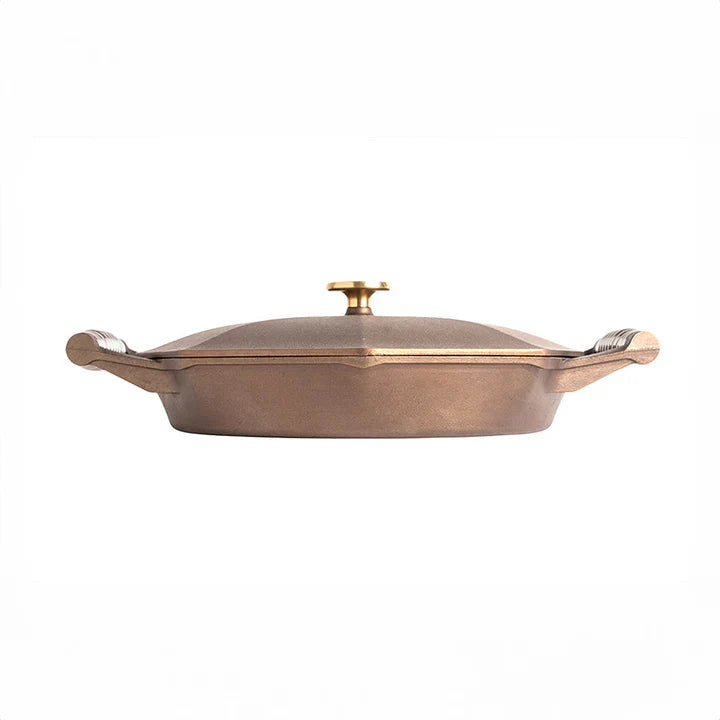 FINEX cast iron skillet with octagonal shape and polished surface, pre-seasoned and ready for cooking.