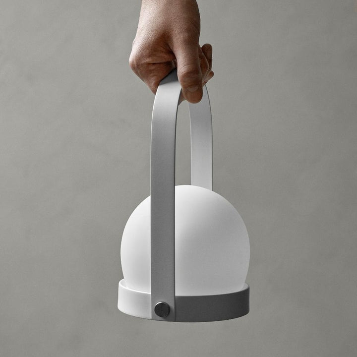 AUDO CPH (ex MENU) Carrie Lamp Portable + Rechargeable, White by Audo Copenhagen - A minimalist innovation for freedom and flexibility, the Carrie Table Lamp, portable with a metal base and glass shade is unique for its multiple uses and mutability. Usefu