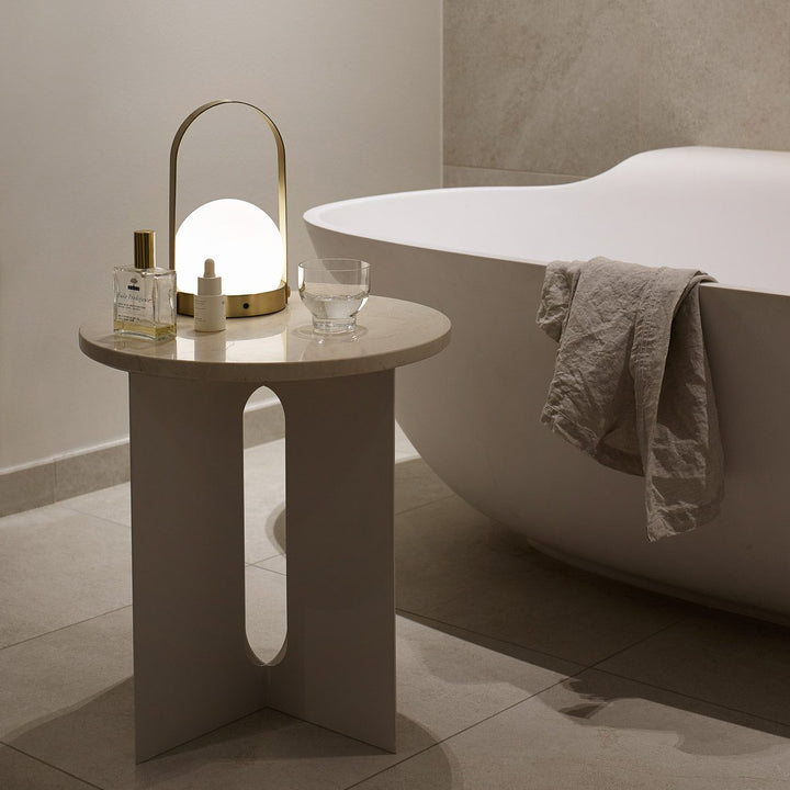 AUDO CPH (ex MENU) Carrie Lamp Portable + Rechargeable, Olive by Audo Copenhagen - A minimalist innovation for freedom and flexibility, the Carrie Table Lamp, portable with a metal base and glass shade is unique for its multiple uses and mutability. Usefu