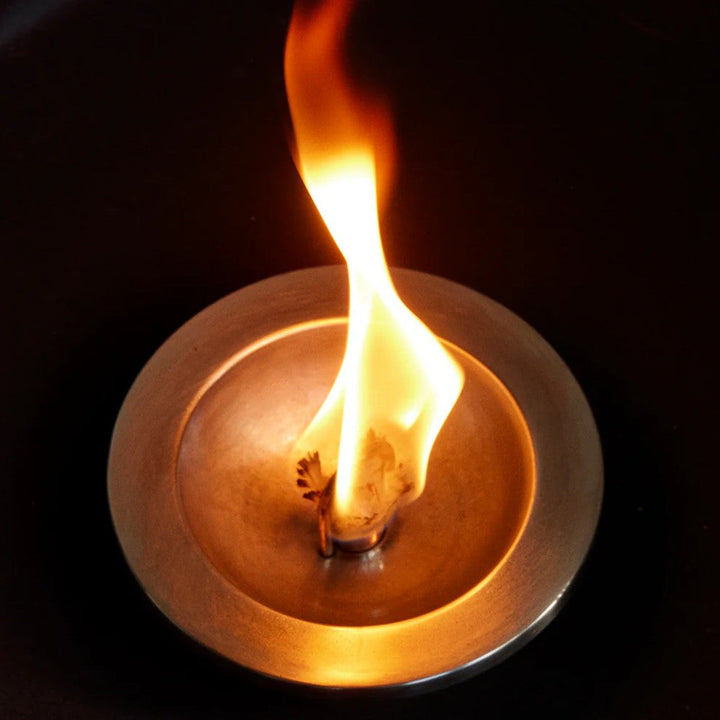 Audo CPH Meira Oil Lantern (Height 13.5 cm), Black by Audo Copenhagen - Product Information:Inspired by ancient torches, the Meira Oil Lantern in powder-coated steel illuminates outdoor spaces as the sun sets. Designed with a refillable oil chamber, the a