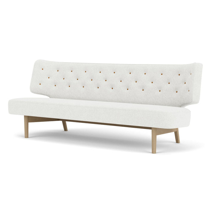 Radiohus 2 Seater Sofa by Audo Copenhagen - An exclusive and rare design from Vilhelm Lauritzen, the Radiohus Sofa was designed for Denmark’s Radio House – today the Royal Danish Academy of Music – in 1936. A pioneering piece of Nordic Functionalism, the