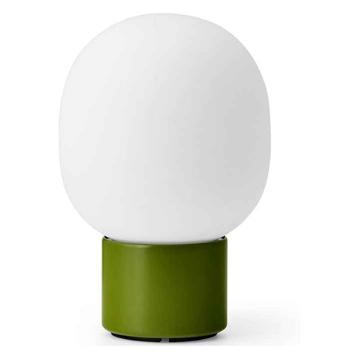 JWDA Portable Table Lamp by Audo Copenhagen - An instant classic, the JWDA Lamp is the kind of sculptural piece that turns heads and brings new life to a room. The contrast of the delicate, rounded glass with the sturdy metal base makes for a balanced and