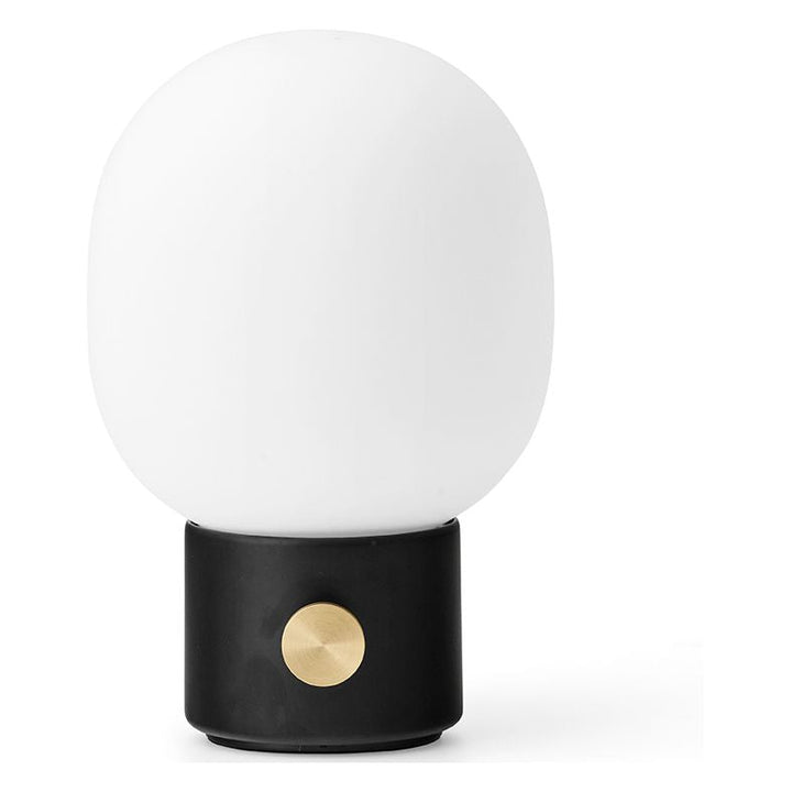 JWDA Portable Table Lamp by Audo Copenhagen - An instant classic, the JWDA Lamp is the kind of sculptural piece that turns heads and brings new life to a room. The contrast of the delicate, rounded glass with the sturdy metal base makes for a balanced and
