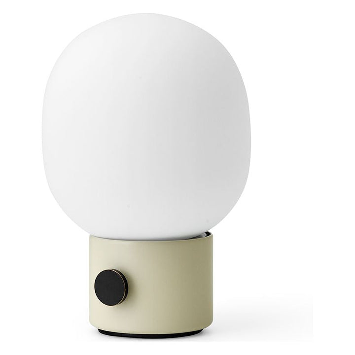 JWDA Portable Table Lamp by Audo Copenhagen - An instant classic, the JWDA Lamp is the kind of sculptural piece that turns heads and brings new life to a room. The contrast of the delicate, rounded glass with the sturdy metal base makes for a balanced and