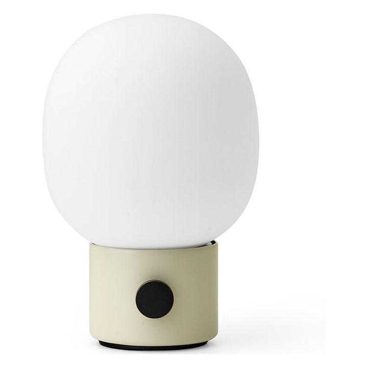 JWDA Portable Table Lamp by Audo Copenhagen - An instant classic, the JWDA Lamp is the kind of sculptural piece that turns heads and brings new life to a room. The contrast of the delicate, rounded glass with the sturdy metal base makes for a balanced and