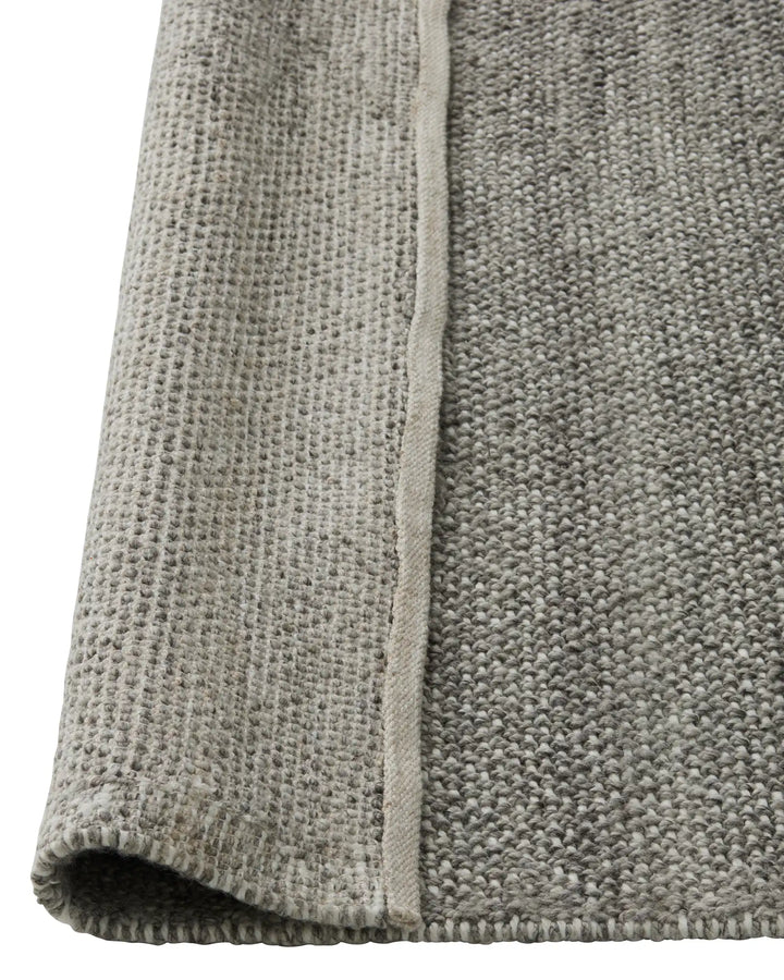 Andorra Dove - Durable and Stylish Floor Rug Andorra Dove is a thick, soft floor rug made from 100% recycled polyester, perfect for indoor and outdoor use.