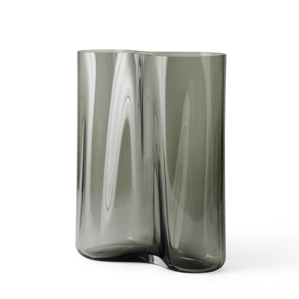 Audo CPH Aer Vase 33 by Audo Copenhagen - Drawing inspiration from the swirling flow of air seen in smoke or mist, Gabriel Tan’s Aer vase for Audo CPH introduces a sculptural elegance to any setting. Named after the Latin term for air or vapor, its asymme