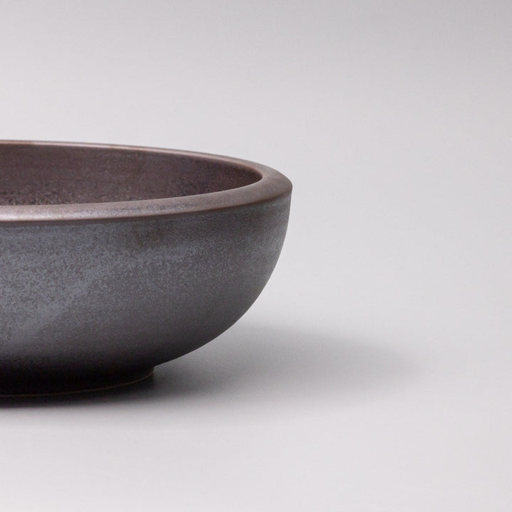 Bowl with thick edge, 24cm in size, featuring a stylish copper glaze finish for a modern tabletop appeal.