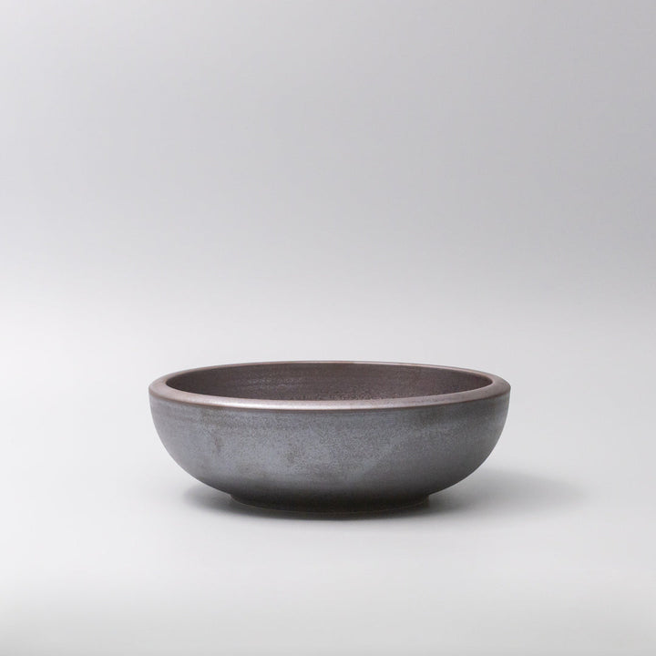 Thick edge 24cm bowl with copper glaze, elegant design for serving and décor.