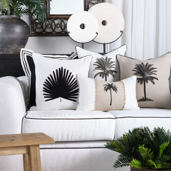 Havana Palm 30x50 Crafted from 100% premium cotton, the Havana Palm 30x50 combines durability with softness for lasting comfort. Featuring intricate chambray applique and detailed piping, this piece showcases expert craftsmanship. The printed design adds