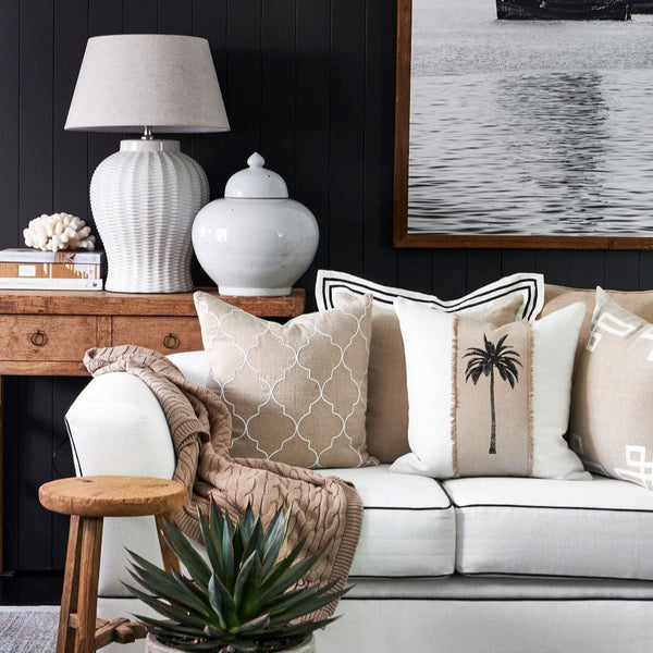 Havana Palm 50x50 Crafted from 100% premium cotton, the Havana Palm 50x50 combines durability with comfort. Featuring a detailed chambray applique, this piece showcases expert craftsmanship and subtle texture. The printed design adds a vibrant, natural ae