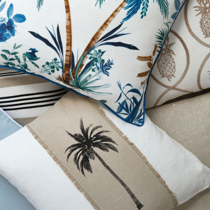 Havana Palm 50x50 Crafted from 100% premium cotton, the Havana Palm 50x50 combines durability with comfort. Featuring a detailed chambray applique, this piece showcases expert craftsmanship and subtle texture. The printed design adds a vibrant, natural ae
