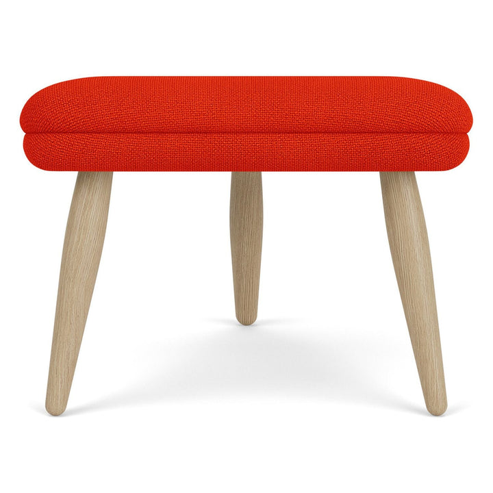 Oda Ottoman by Audo Copenhagen - Designed for use with Arnold Madsen’s Oda Chair but equally purposeful alone, the Oda Ottoman profiles the same careful craft and embracing form, shaped to offer comfortable support when seated. Constructed according to a