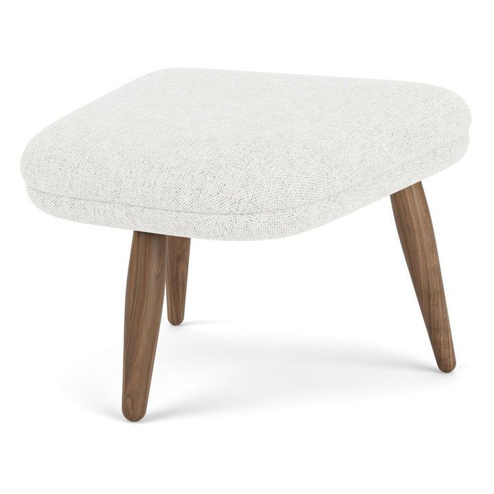Oda Ottoman by Audo Copenhagen - Designed for use with Arnold Madsen’s Oda Chair but equally purposeful alone, the Oda Ottoman profiles the same careful craft and embracing form, shaped to offer comfortable support when seated. Constructed according to a