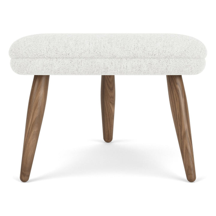 Oda Ottoman by Audo Copenhagen - Designed for use with Arnold Madsen’s Oda Chair but equally purposeful alone, the Oda Ottoman profiles the same careful craft and embracing form, shaped to offer comfortable support when seated. Constructed according to a