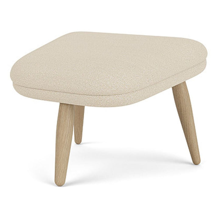 Oda Ottoman by Audo Copenhagen - Designed for use with Arnold Madsen’s Oda Chair but equally purposeful alone, the Oda Ottoman profiles the same careful craft and embracing form, shaped to offer comfortable support when seated. Constructed according to a