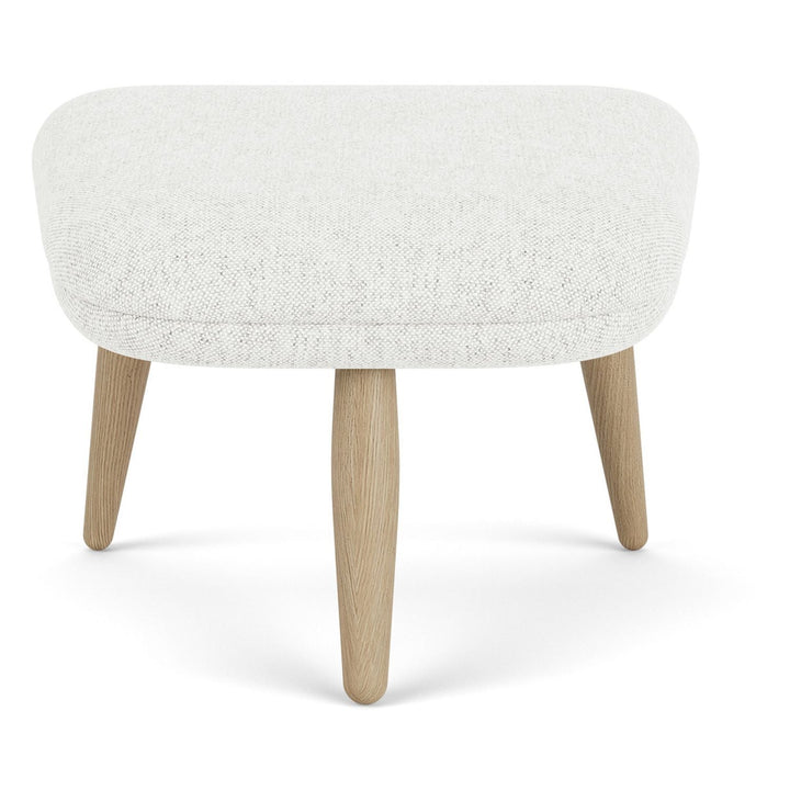 Oda Ottoman by Audo Copenhagen - Designed for use with Arnold Madsen’s Oda Chair but equally purposeful alone, the Oda Ottoman profiles the same careful craft and embracing form, shaped to offer comfortable support when seated. Constructed according to a
