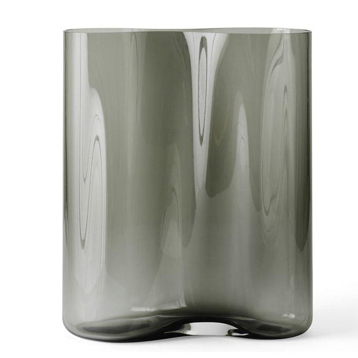 Aer Vase by Audo Copenhagen - Designer Gabriel Tan's appreciation of simplicity, sculptural beauty and functionality come together in the Aer Collection. The rippled, asymmetrical silhouette of the Aer Vase is perfect for admiring from afar and exploring