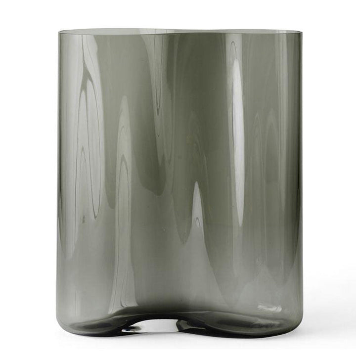 Aer Vase by Audo Copenhagen - Designer Gabriel Tan's appreciation of simplicity, sculptural beauty and functionality come together in the Aer Collection. The rippled, asymmetrical silhouette of the Aer Vase is perfect for admiring from afar and exploring