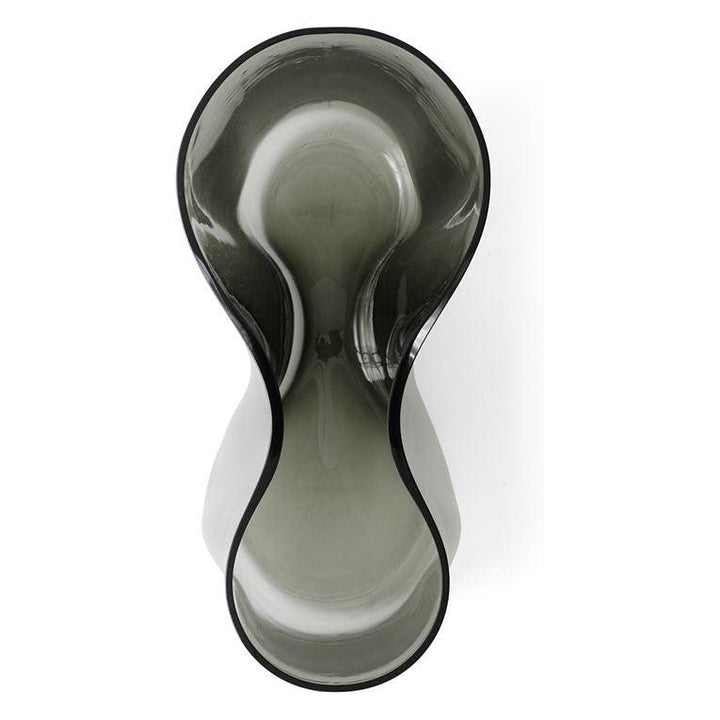 Aer Vase by Audo Copenhagen - Designer Gabriel Tan's appreciation of simplicity, sculptural beauty and functionality come together in the Aer Collection. The rippled, asymmetrical silhouette of the Aer Vase is perfect for admiring from afar and exploring