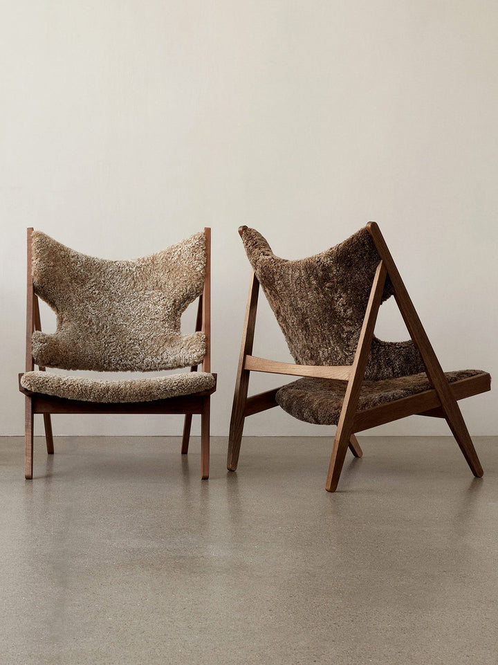 AUDO CPH Knitting Chair - Dark Oak & Sheepskin Shop the iconic AUDO CPH Knitting Lounge Chair, handcrafted in Sweden with luxe sheepskin for supreme comfort & elegance. by Audo Copenhagen Available at beon.com.au | Australian Stock