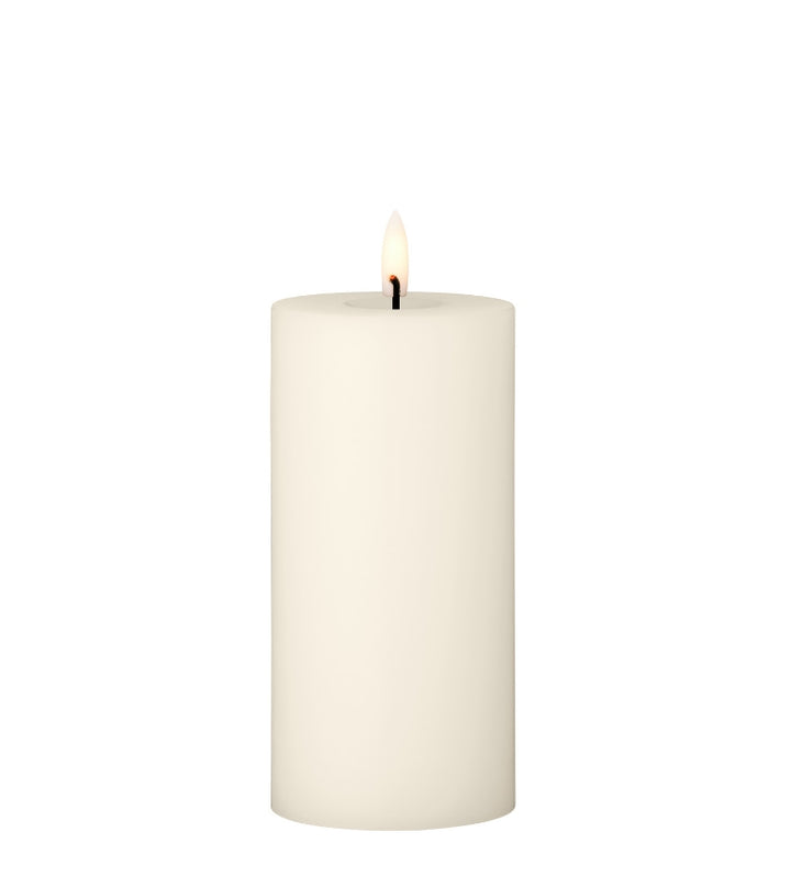 Ester & Erik LED pillar candle with lifelike glow, perfect for events or everyday use.