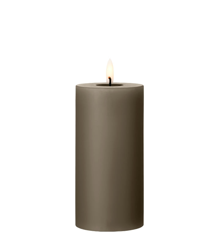 Ester & Erik LED Pillar Candle in olive green with a lifelike glow, perfect for special events or everyday elegance.