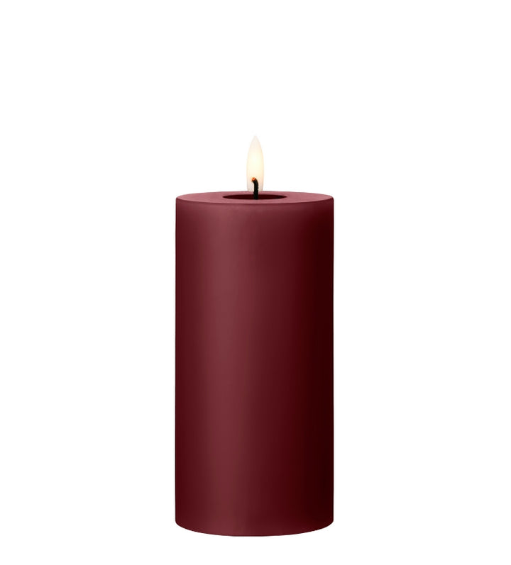 Ester & Erik LED pillar candle in deep burgundy, featuring a lifelike glow for elegant decor.