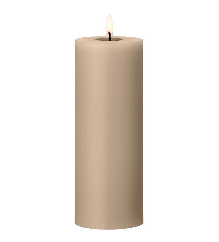 Ester & Erik LED pillar candle in beige, featuring a lifelike glow for a luxurious ambiance.