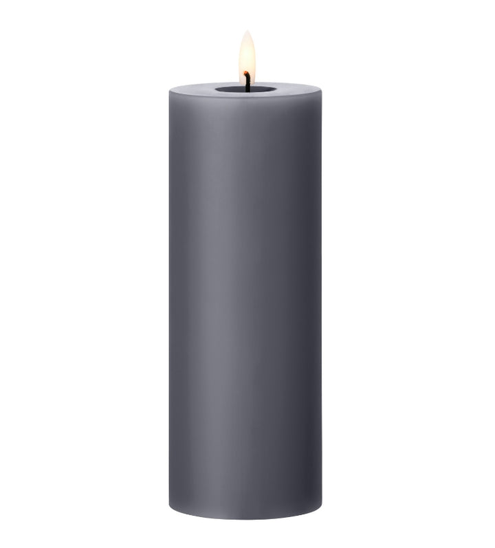 Ester & Erik LED pillar candle in grey with lifelike glow for elegant decor and ambiance.
