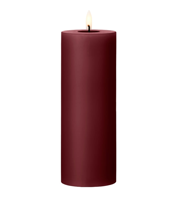 Ester & Erik LED Pillar Candle in deep red with lifelike glow for special events and everyday elegance.