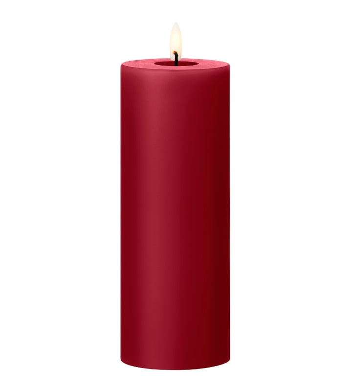 Ester & Erik LED pillar candle in red with lifelike glow, perfect for special events and everyday elegance.