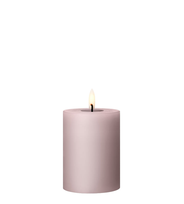 Ester & Erik LED pillar candle in soft pink, featuring a realistic glow for elegant home décor.