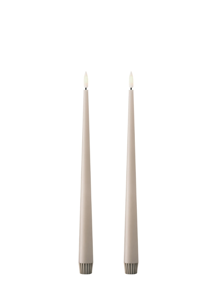 Ester & Erik LED taper candles in soft beige, set of 2, designed for elegance and realistic glow in modern decor.