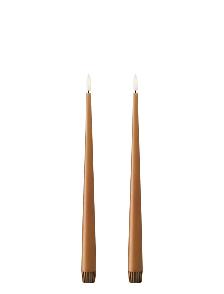 Ester & Erik LED taper candles in warm brown, elevating modern decor with elegance and realistic glow.