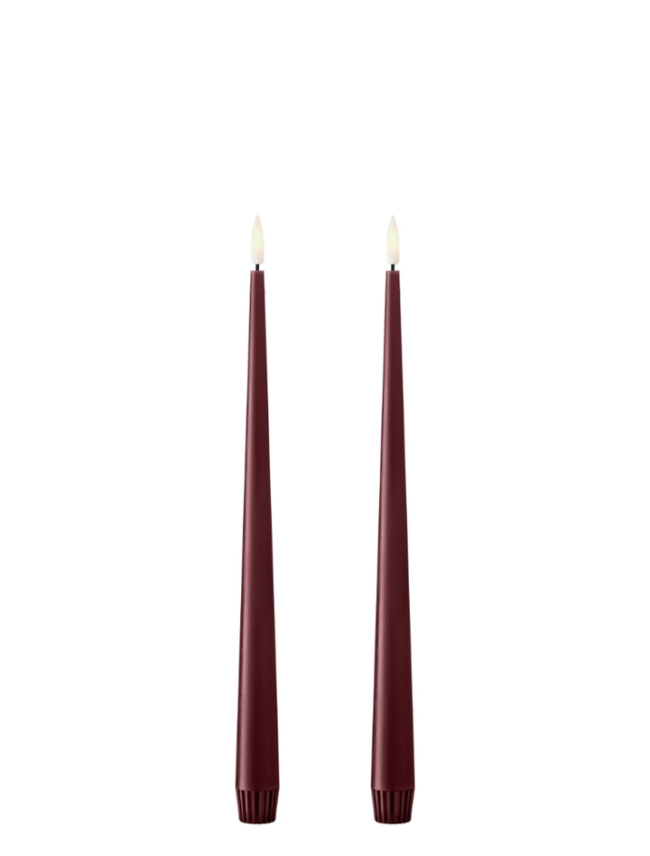 Ester & Erik LED taper candles in burgundy, 2 pcs, offering elegance and realistic glow for any modern setting.